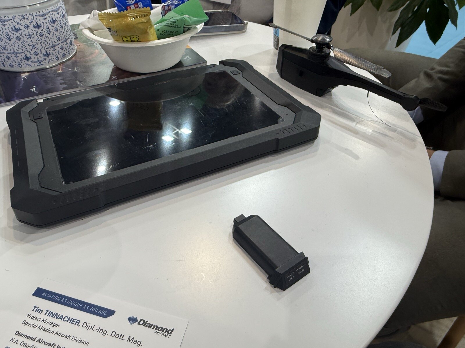 NOX reconnaissance drone system at Eurosatory with rugged control tablet and battery pack.